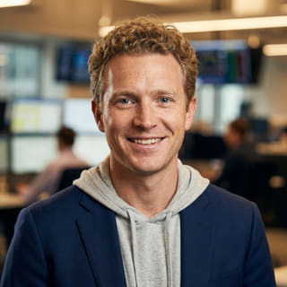 Profile photo for Ryan Brooks, listed as Lead Trading Analyst at Test NCTheme